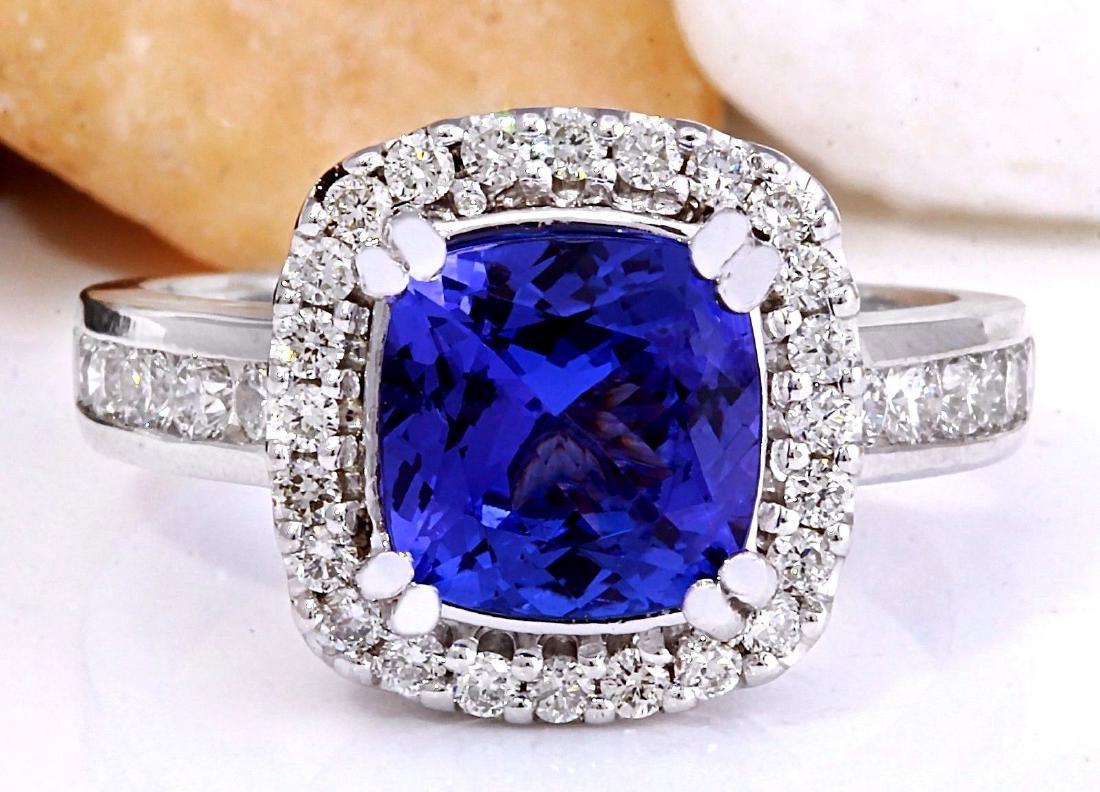 3.70 Carat Natural Tanzanite 18K Solid White Gold: 3.70 Carat Natural Tanzanite 18K Solid White Gold Diamond Ring Item Type: Ring Item Style: Engagement Material: 18K White Gold Mainstone: Tanzanite Stone Color: Blue Stone Weight: 2.70 Carat Stone Sha