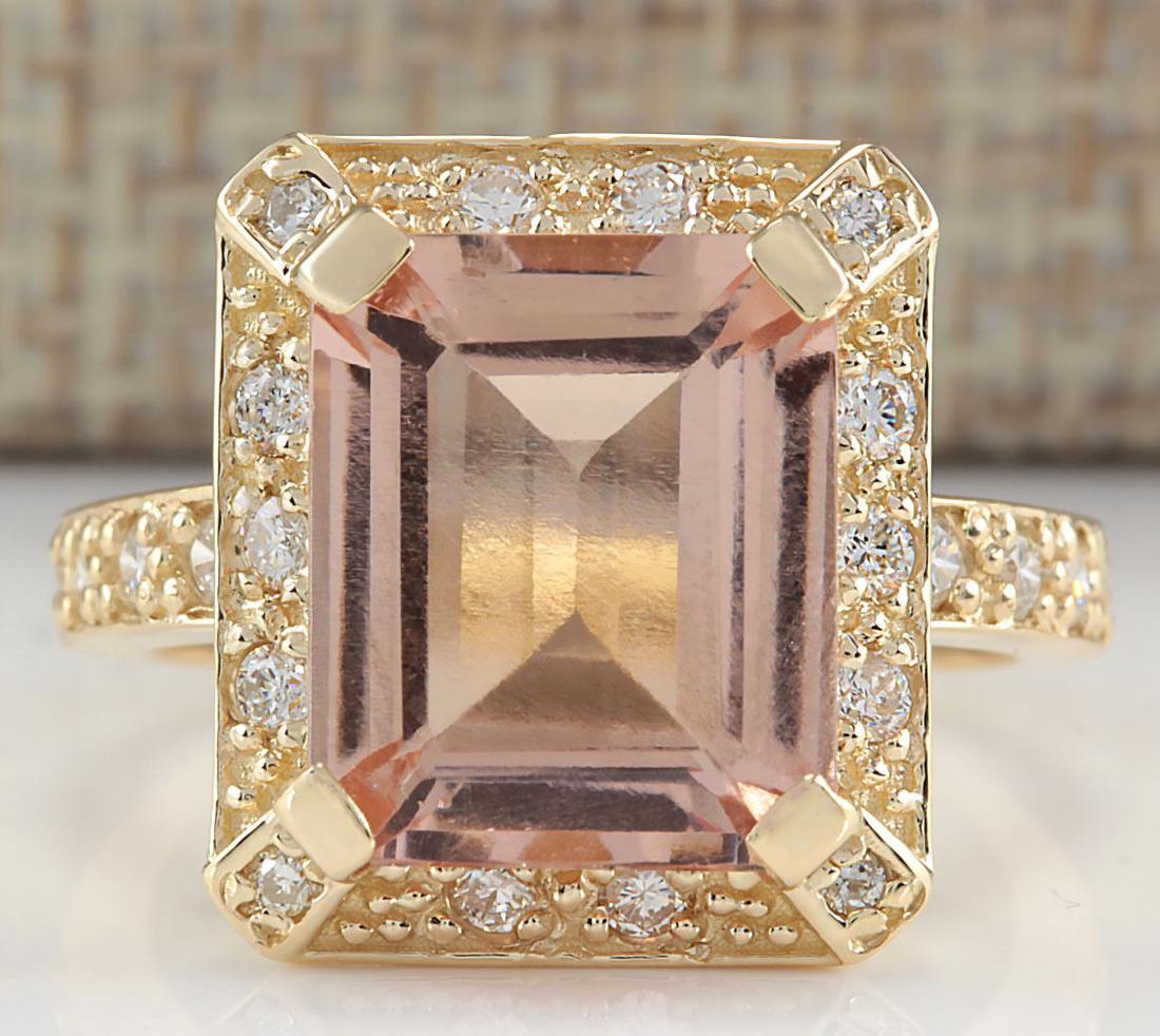 5.56Carat Natural Morganite And Diamond Ring In 18K: Stamped: 18K Ring Size: 6.5 Total Ring Weight: 8 Grams Diamond Weight: Total natural diamond weight is .50carat. VS2-SI1 clarity / F-G color Gemstone Weight: Total Natural Morganite Weight is 5.06ctw 
