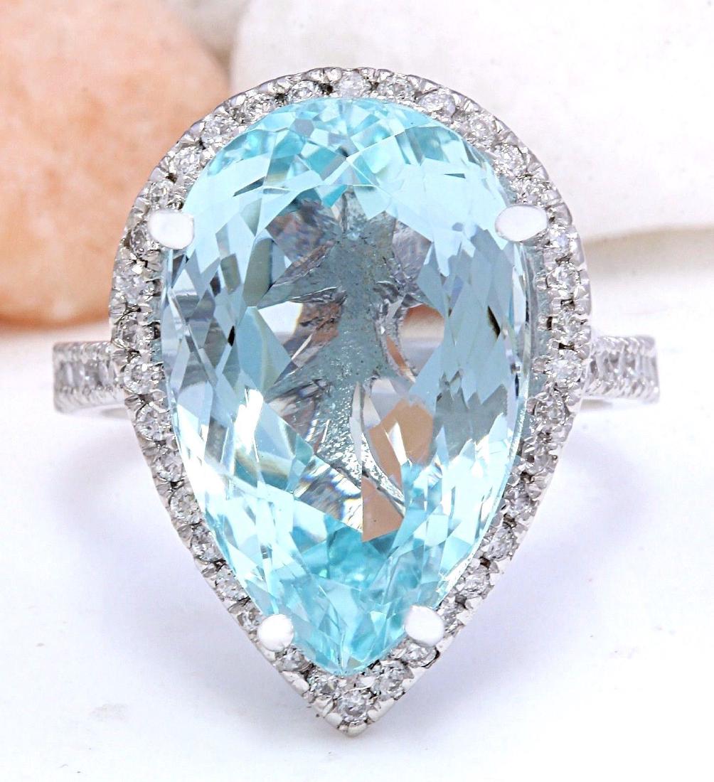 12.49 Carat Natural Aquamarine 18K Solid White Gold: 12.49 Carat Natural Aquamarine 18K Solid White Gold Diamond Ring Item Type: Ring Item Style: Cocktail Material: 18K White Gold Mainstone: Aquamarine Stone Color: Blue Stone Weight: 11.79 Carat Stone S