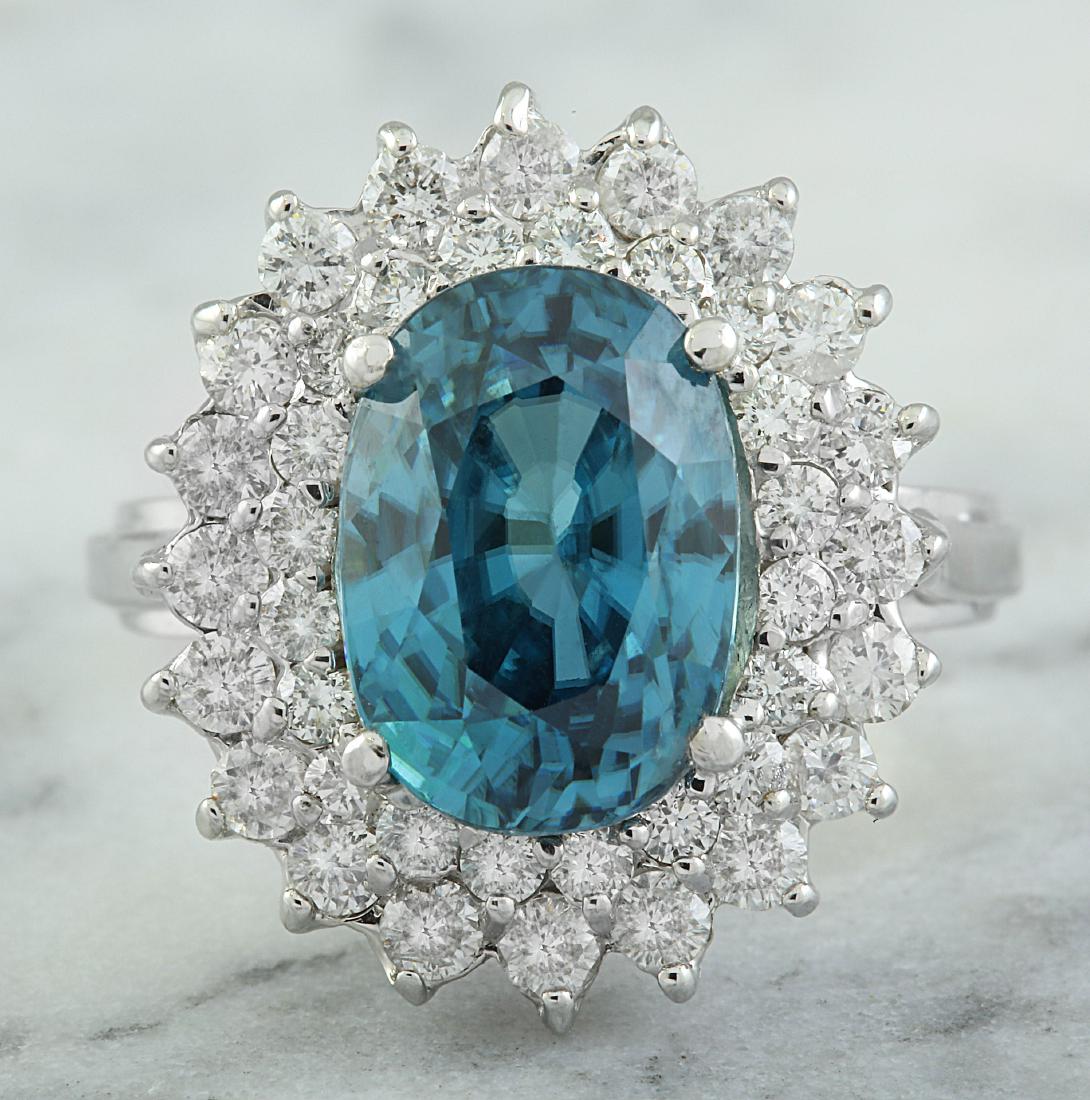 8.52 Carat Zircon 18K White Gold Diamomd Ring: Stamped: 18K Ring Size: 7 Total Ring Weight: 7.4 Grams Zircon Weight: 7.22 Carat (11.80x8.20 Millimeter) Diamond Weight: 1.30 Carat (F-G Color, VS2-SI1 Clarity Face Measures: 19.80x16.70 Millimeter SK