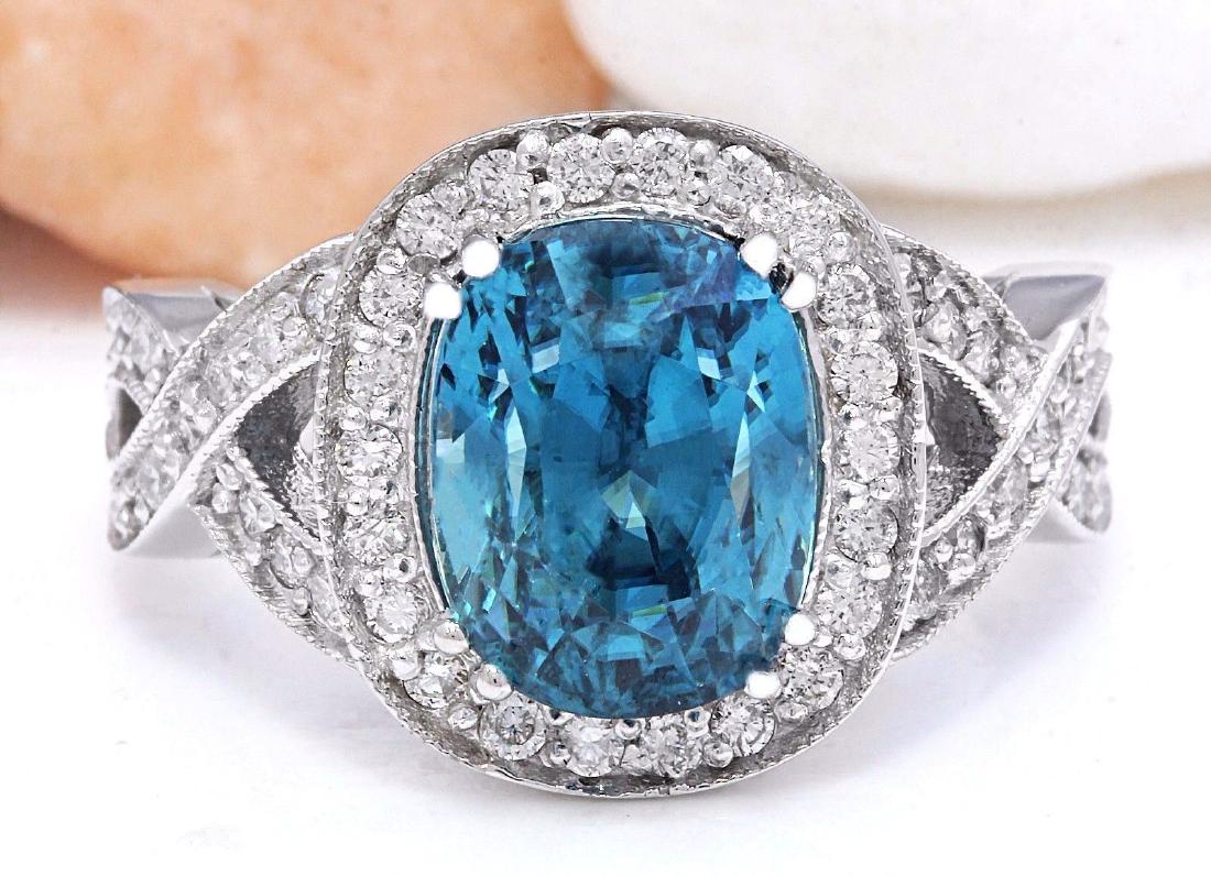 7.20 Carat Natural Zircon 18K Solid White Gold Diamond: 7.20 Carat Natural Zircon 18K Solid White Gold Diamond Ring Item Type: Ring Item Style: Engagement Material: 18K White Gold Mainstone: Zircon Stone Color: Blue Stone Weight: 6.45 Carat Stone Shape: Cu