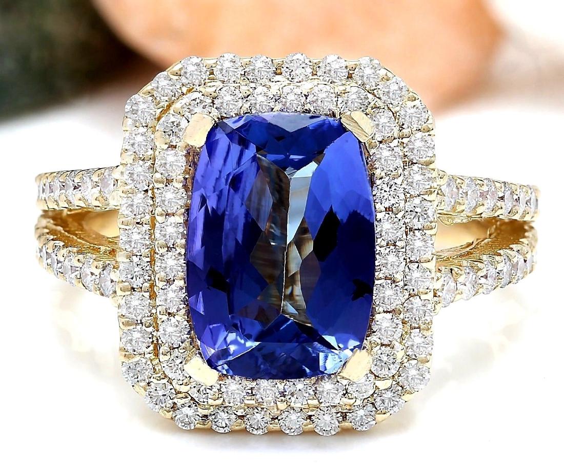 4.29 Carat Natural Tanzanite 18K Solid Yellow Gold: 4.29 Carat Natural Tanzanite 18K Solid Yellow Gold Diamond Ring Item Type: Ring Item Style: Engagement Material: 18K Yellow Gold Mainstone: Tanzanite Stone Color: Blue Stone Weight: 2.79 Carat Stone S