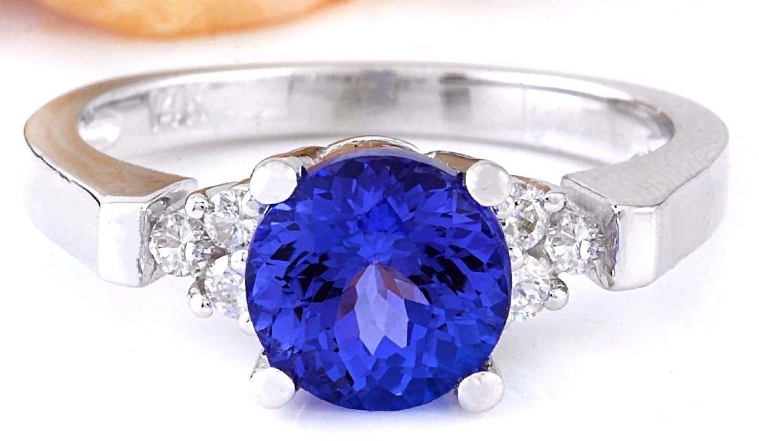 2.35 Carat Natural Tanzanite 18K Solid White Gold: 2.35 Carat Natural Tanzanite 18K Solid White Gold Diamond Ring Item Type: Ring Item Style: Engagement Material: 18K White Gold Mainstone: Tanzanite Stone Color: Blue Stone Weight: 2.15 Carat Stone Sha