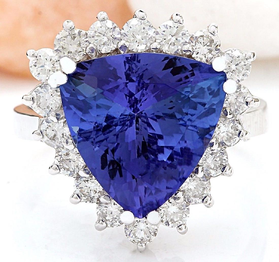 6.57 Carat Natural Tanzanite 18K Solid White Gold: 6.57 Carat Natural Tanzanite 18K Solid White Gold Diamond Ring Item Type: Ring Item Style: Engagement Material: 18K White Gold Mainstone: Tanzanite Stone Color: Blue Stone Weight: 5.57 Carat Stone Sha