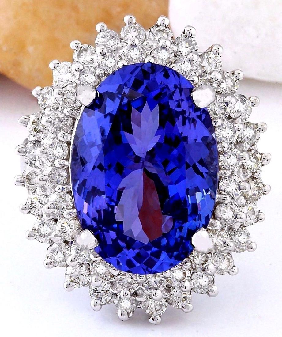 11.36 Carat Natural Tanzanite 18K Solid White Gold: 11.36 Carat Natural Tanzanite 18K Solid White Gold Diamond Ring Item Type: Ring Item Style: Cocktail Material: 18K White Gold Mainstone: Tanzanite Stone Color: Blue Stone Weight: 8.36 Carat Stone Shap