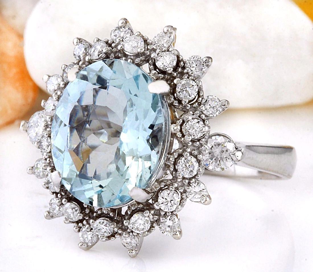 4.65 Carat Natural Aquamarine 18K Solid White Gold: 4.65 Carat Natural Aquamarine 18K Solid White Gold Diamond Ring Item Type: Ring Item Style: Cocktail Material: 18K White Gold Mainstone: Aquamarine Stone Color: Blue Stone Weight: 3.80 Carat Stone Sha