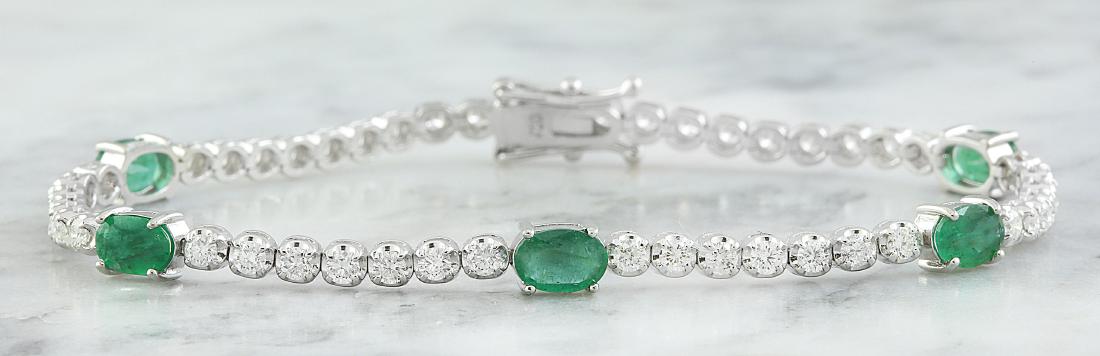 4.03 Carat Emerald 18K White Gold Diamond Bracelet: Stamped: 750 Total Bracelet Weight: 8 Grams Bracelet Length: 7 Inches Emerald Weight: 2.20 Carat (6.00x4.00 Millimeter) Diamond Weight: 1.83 Carat (F-G Color, VS2-SI1 Clarity Face Measures: 4.00 Milli