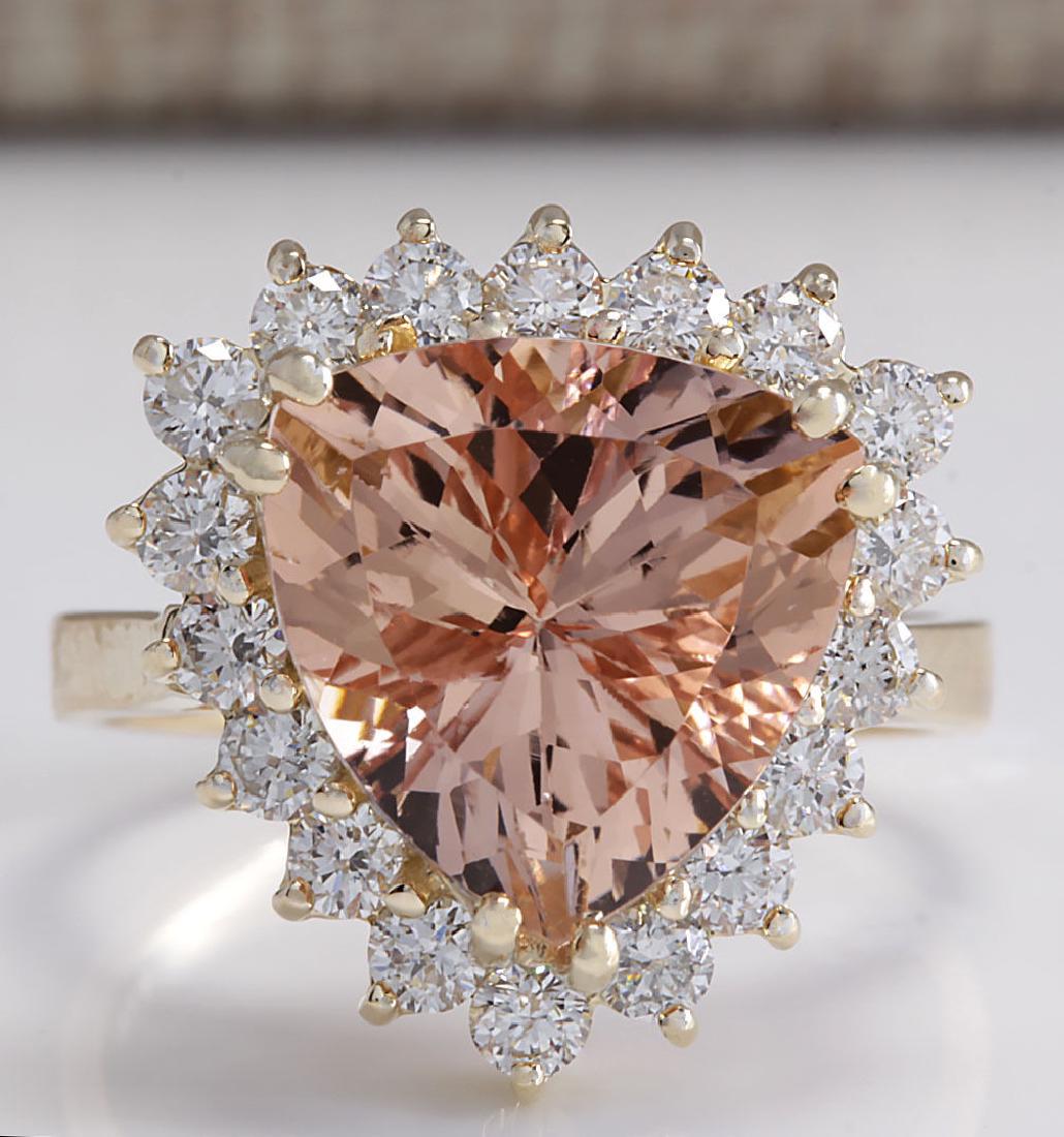 6.27Carat Natural Peach Morganite And Diamond Ring In: Stamped: 18K Ring Size: 6.5 Total Ring Weight: 5.5 Grams Diamond Weight: Total natural diamond weight is 1.00carat. VS2-SI1 clarity / F-G color Gemstone Weight: Total Natural Peach Morganite Weight is