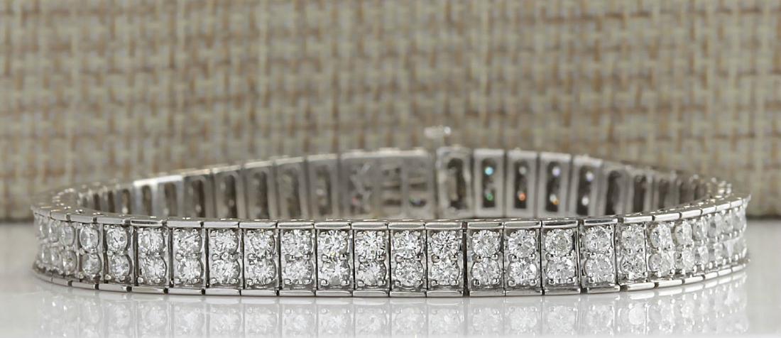 12 Carat Natural Diamond Bracelet In 18K Solid White: Stamped: 18K Bracelet Width: 6.20mm Bracelet Length: 7.5 Inches Total Bracelet Weight: 20.3 Grams Diamond Weight: Total natural diamond weight is 12.00carat. VS2-SI1 clarity / G-H color SKU: [703523]