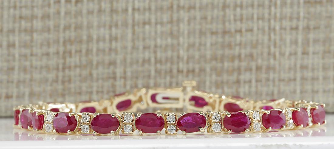 11.01Carat Natural Ruby And Diamond Bracelet In 18K: Stamped: 18K Total Bracelet Weight: 12 Grams Diamond Weight: Total natural diamond weight is 1.00carat. VS2-SI1 clarity / F-G color Gemstone Weight: Total Natural Ruby Weight is 10.01ctw (Measures: 4.