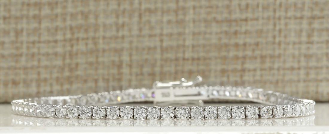 4.50 Carat Natural Diamond Bracelet In 18K Solid White: Stamped: 18K Bracelet Width: 2.90mm Bracelet Length: 7.5 Inches Total Bracelet Weight: 8.4Grams Diamond Weight: Total natural diamond weight is 4.50carat. VS2-SI1 clarity / G-H color SKU: [703369]