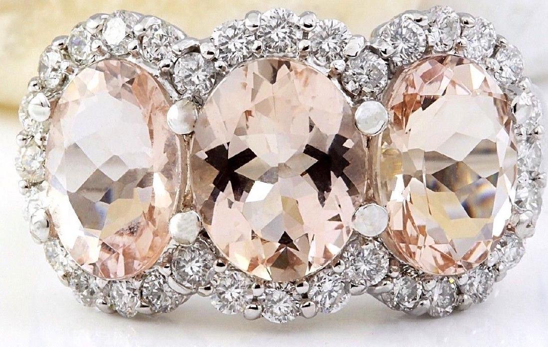 8.23 Carat Natural Morganite 18K Solid White Gold: 8.23 Carat Natural Morganite 18K Solid White Gold Diamond Ring Item Type: Ring Item Style: Cocktail Material: 18K White Gold Mainstone: Morganite Stone Color: Peach Stone Weight: 7.48 Carat Stone Shap