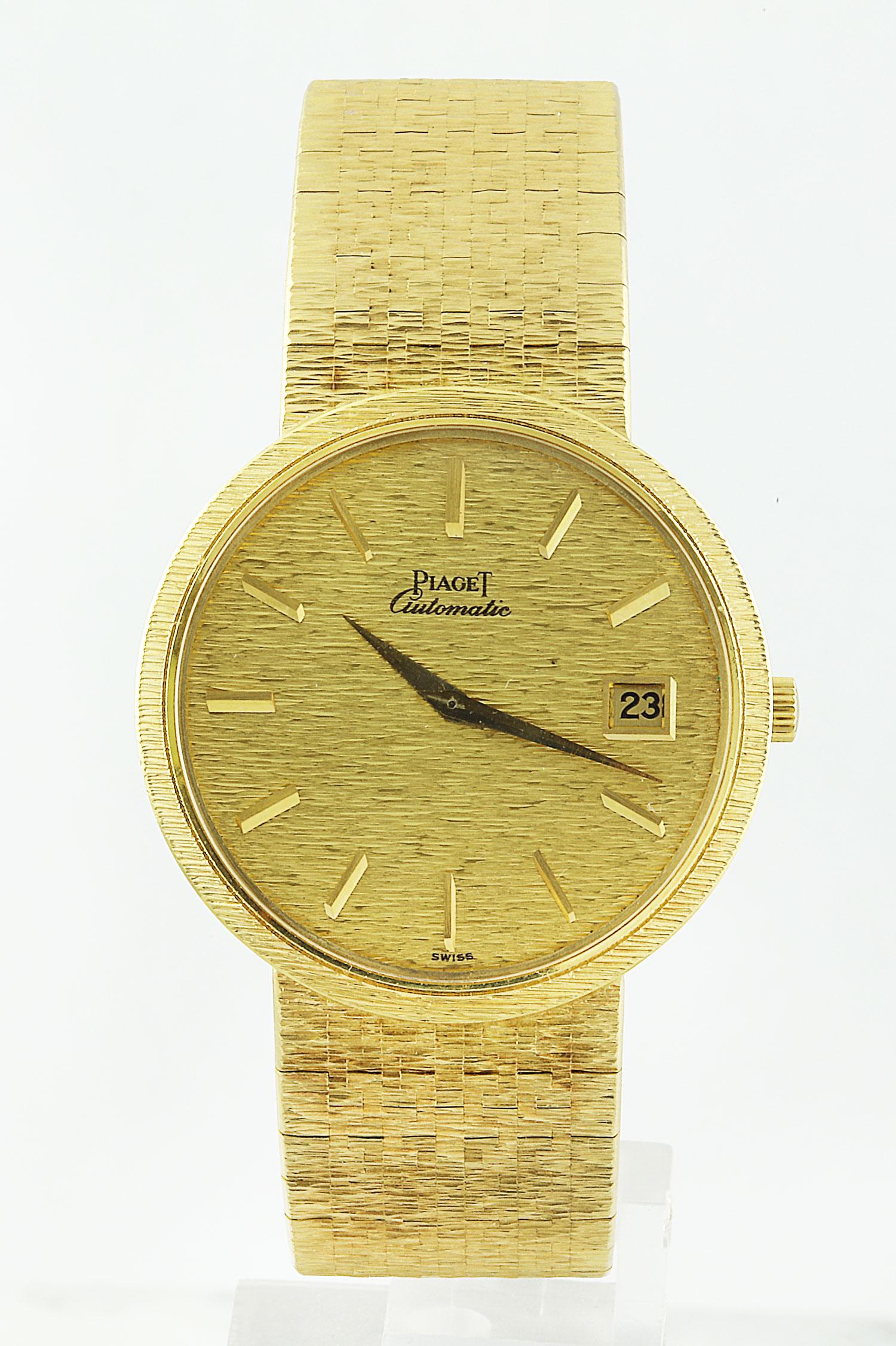 Authentic Piaget 18K Yellow Gold Watch: Stamped: 750 Total Watch Weight: 94.1 Grams Face Measures: 34.00 Millimeter