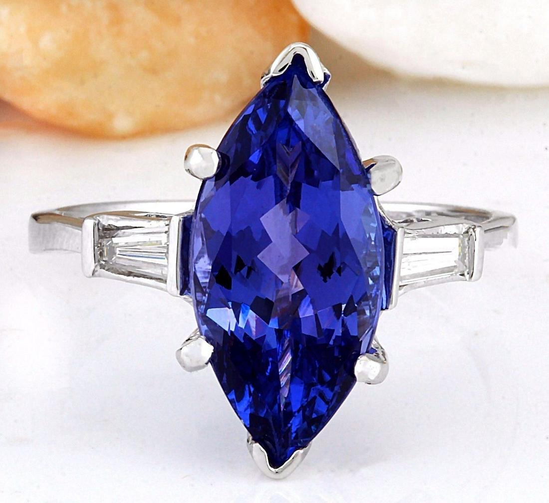 5.30 Carat Natural Tanzanite 18K Solid White Gold: 5.30 Carat Natural Tanzanite 18K Solid White Gold Diamond Ring Item Type: Ring Item Style: Cocktail Material: 18K White Gold Mainstone: Tanzanite Stone Color: Blue Stone Weight: 5.00 Carat Stone Shape