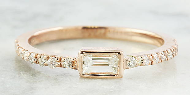 0.43 CTW Diamond 14K Rose Gold Ring: 0.43 CTW Diamond 14K Rose Gold Ring Manufacturer's Suggested Retail Price: $ 2500.00 Stamped: 14K Total Ring Weight: 2 Grams Center Diamond Weight 0.25 Carat (4.00x2.00 Millimeters, F-G Color,