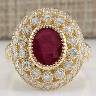 3.64 CTW Natural Ruby Diamond Ring 14K Solid Yellow: 3.64 CTW Natural Ruby Diamond Ring 14K Solid Yellow Gold Manufacturer's Suggested Retail Price: $ 6850.00 Stamped: 14K Ring Size: 7 Total Ring Weight: 7.8 Grams Diamond Weight: Total