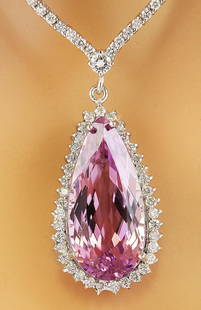 34.60 CTW Kunzite 14K White Gold Diamond Necklace: 34.60 CTW Kunzite 14K White Gold Diamond Necklace Manufacturer's Suggested Retail Price: $ 26300.00 Stamped: 585 Total Necklace Weight: 30.6 Grams Necklace Length: 16.5 Inches Kunzite Weight: