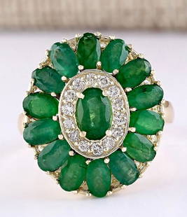 4.10 CTW Natural Emerald And Diamond Ring In 18K Yellow: 4.10 CTW Natural Emerald And Diamond Ring In 18K Yellow Gold Manufacturer's Suggested Retail Price: $ 3800.00 Stamped: 18K Ring Size: 6.75 Total Ring Weight: 5.08 Grams Diamond Weight: 