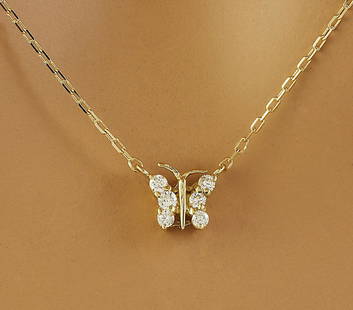 0.20 CTW Diamond 18K Yellow Gold Necklace: 0.20 CTW Diamond 18K Yellow Gold Necklace Manufacturer's Suggested Retail Price: $ 1750.00 Stamped: 18K Total Necklace Weight: 2.5 Grams Necklace Length: 16 Inches Diamond Weight: 0.20 Carat (F-G