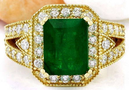 4.35 CTW Natural Emerald 14K Solid Yellow Gold Diamond: 4.35 CTW Natural Emerald 14K Solid Yellow Gold Diamond Ring Manufacturer's Suggested Retail Price: $ 7300.00 4.35 Carat Natural Emerald 14K Solid Yellow Gold Diamond Ring Item Type: Ring Item