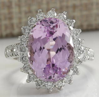 9.96 CTW Natural Kunzite And Diamond Ring In 18K Solid: 9.96 CTW Natural Kunzite And Diamond Ring In 18K Solid White Gold Manufacturer's Suggested Retail Price: $ 7750.00 Stamped: 18K Ring Size: 6.25 Total Ring Weight: 7 Grams Diamond Weight: 
