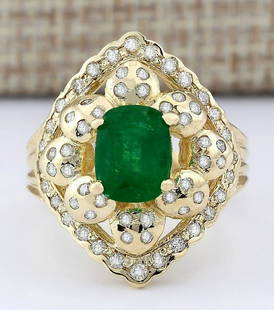 3.12 CTW Natural Emerald And Diamond Ring In 14k Yellow: 3.12 CTW Natural Emerald And Diamond Ring In 14k Yellow Gold Manufacturer's Suggested Retail Price: $ 7400.00 Stamped: 14K Ring Size: 7.25 Total Ring Weight: 7.4 Grams Diamond Weight: 