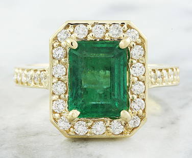 3.40 CTW Emerald 14K Yellow Gold Diamond Ring: 3.40 CTW Emerald 14K Yellow Gold Diamond Ring Manufacturer's Suggested Retail Price: $ 6050.00 Stamped: 14K Total Ring Weight: 6.2 Grams Emerald Weight 2.80 Carat (9.00x7.00 Millimeters)