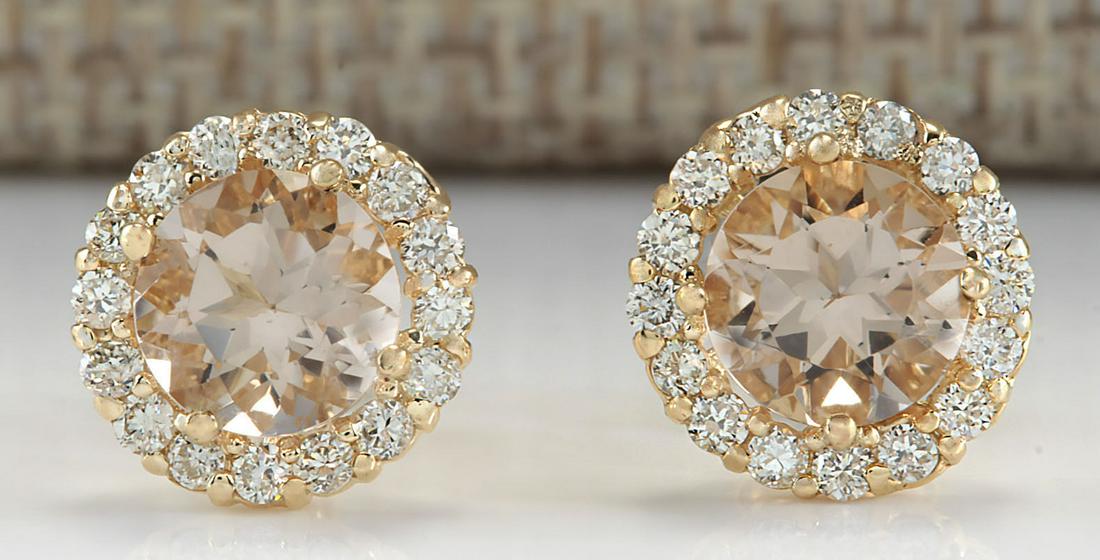 3.65 CTW Natural Morganite And Diamond Earrings 14k: 3.65 CTW Natural Morganite And Diamond Earrings 14k Solid Yellow Gold Manufacturer's Suggested Retail Price: $ 3500.00 Stamped: 14K Total Earring Weight: 2Grams Diamond Weight: Total Natural diamond w