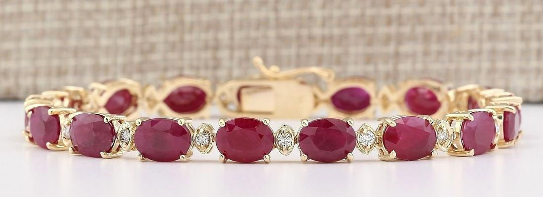 28.58 CTW Natural Red Ruby And Diamond Bracelet In 18K: 28.58 CTW Natural Red Ruby And Diamond Bracelet In 18K Yellow Gold Manufacturer's Suggested Retail Price: $ 13900.00 Stamped: 18K Bracelet Width: 6.22mm Bracelet Length: 7.4 Inches Total Bracelet Weig