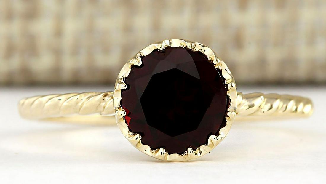 1.50 CTW Natural Garnet Ring In 18K Yellow Gold: 1.50 CTW Natural Garnet Ring In 18K Yellow Gold Manufacturer's Suggested Retail Price: $ 1200.00 Stamped: 18K Ring Size: 6.75 Total Ring Weight: 1.8 Grams Gemstone Weight: Total Natural Garnet Weight 