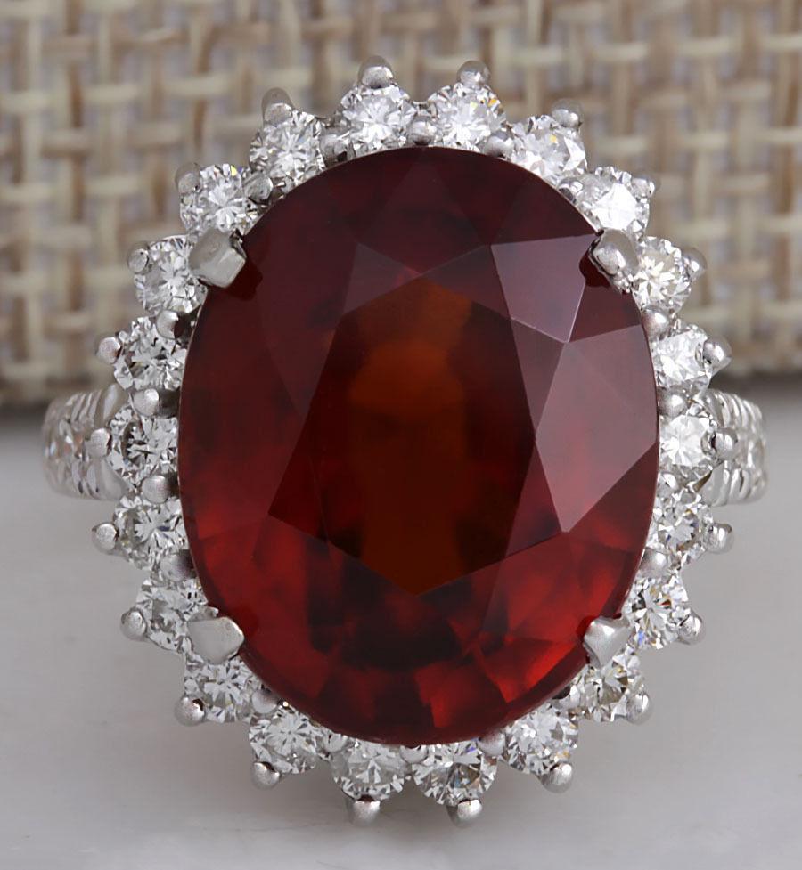 18.43 CTW Natural Red Hessonite Garnet And Diamond Ring: 18.43 CTW Natural Red Hessonite Garnet And Diamond Ring In18K White Gold Manufacturer's Suggested Retail Price: $ 12600.00 Stamped: 18K Ring Size: 6.5 Total Ring Weight: 8.7 Grams Diamond Weight: Tota