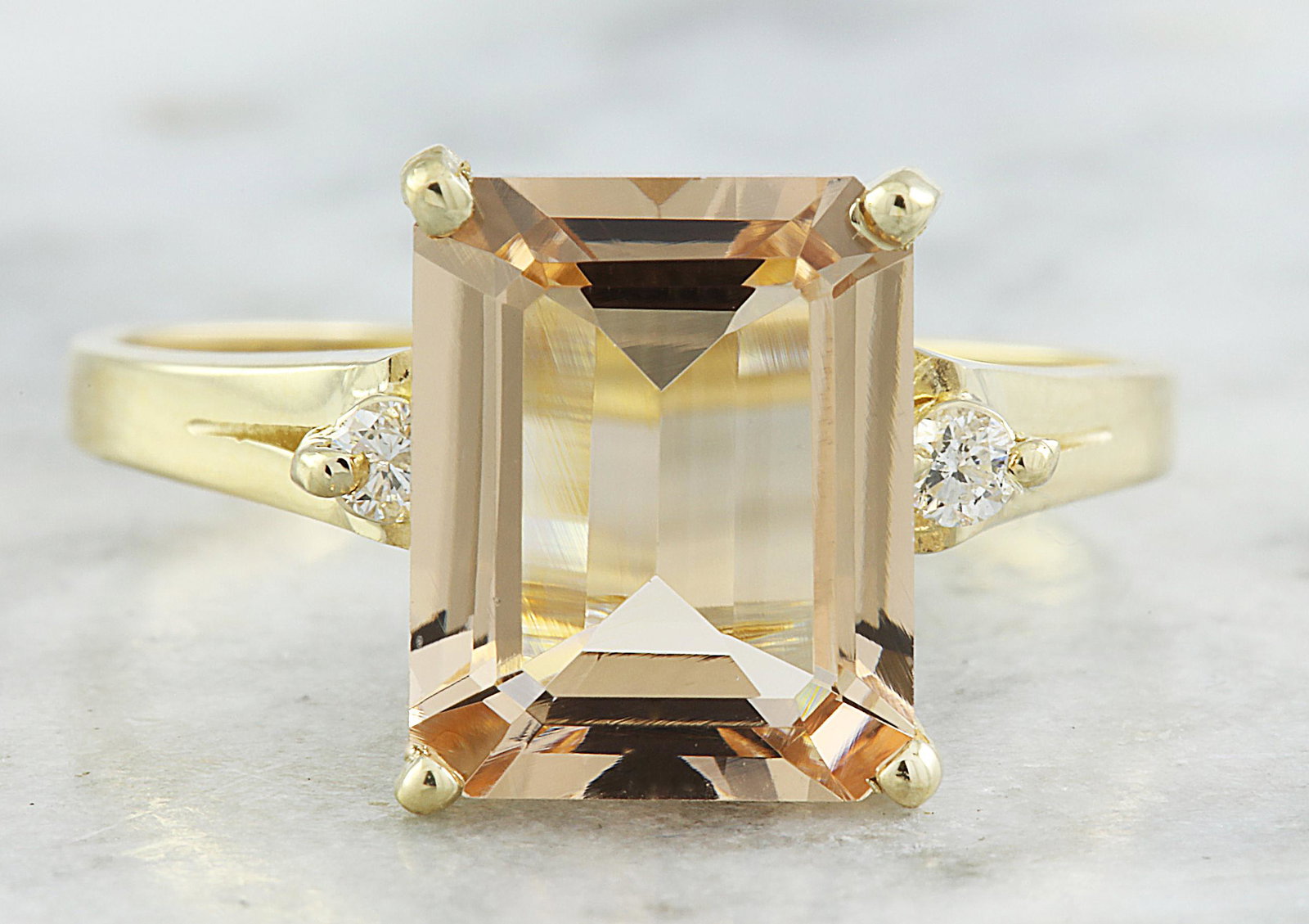 2.26 CTW Morganite 14K Yellow Gold Diamond Ring: 2.26 CTW Morganite 14K Yellow Gold Diamond Ring Manufacturer's Suggested Retail Price: $ 2050.00 Stamped: 14K Total Ring Weight: 2.9 Grams Morganite Weight 2.20 Carat (10.00x8.00Millimeters) Diamond W