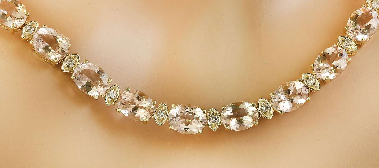 61.50 Carats Morganite 18K Yellow Gold Diamond Necklace: 61.50 Carats Morganite 18K Yellow Gold Diamond Necklace Manufacturer's Suggested Retail Price: $ 22400.00 Stamped: 18K Total Necklace Weight: 34.00 Grams Necklace Length: 19 Inches Morganite Weight: 6