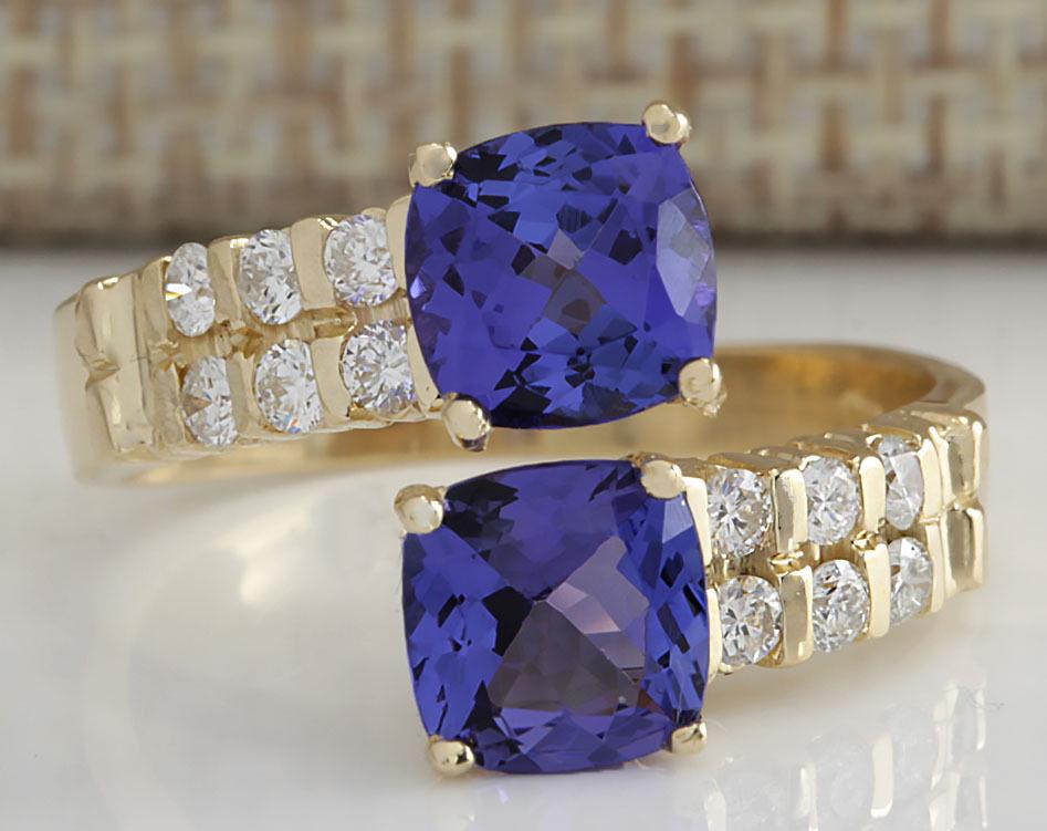 2.82 CTW Natural Blue Tanzanite And Diamond Ring In 14K: 2.82 CTW Natural Blue Tanzanite And Diamond Ring In 14K Solid Yellow Gold Manufacturer's Suggested Retail Price: $ 3500.00 Stamped: 14K Ring Size: 7.25 Total Ring Weight: 4.5 Grams Diamond Weight: Tot