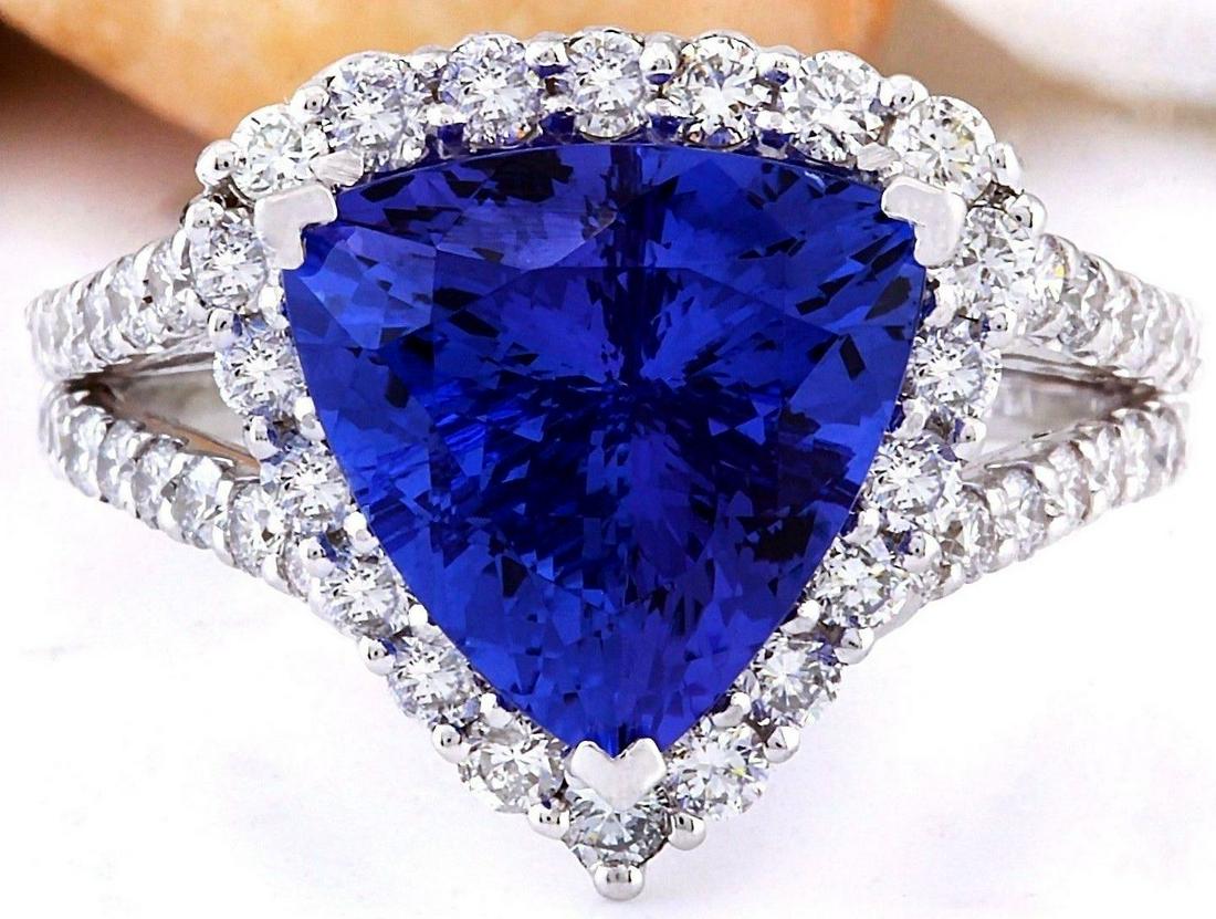5.03 CTW Natural Tanzanite 18K Solid White Gold Diamond: 5.03 CTW Natural Tanzanite 18K Solid White Gold Diamond Ring Manufacturer's Suggested Retail Price: $ 8000.00 5.03 Carat Natural Tanzanite 18K Solid White Gold Diamond Ring Item Type: Ring Item Style: