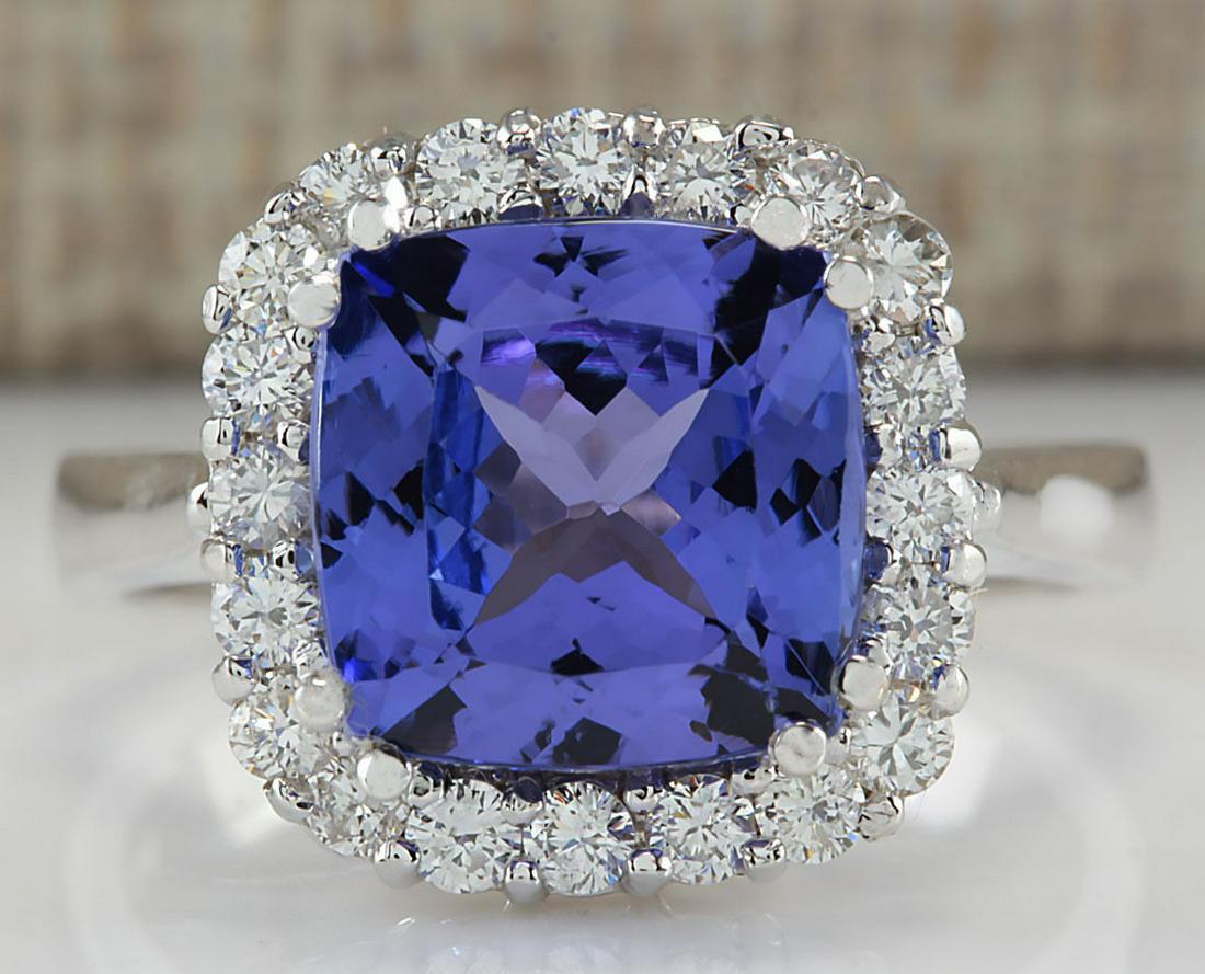 5.33 CTW Natural Blue Tanzanite And Diamond Ring 14K: 5.33 CTW Natural Blue Tanzanite And Diamond Ring 14K Solid White Gold Manufacturer's Suggested Retail Price: $ 7000.00 Stamped: 14K Ring Size: 6.75 Total Ring Weight: 5 Grams Diamond Weight: Total Nat