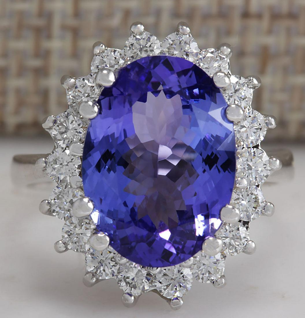 6.80CTW Natural Blue Tanzanite And Diamond Ring 14K: 6.80CTW Natural Blue Tanzanite And Diamond Ring 14K Solid White Gold Manufacturer's Suggested Retail Price: $ 9300.00 Stamped: 14K Ring Size: 6.75 Total Ring Weight: 6.4 Grams Diamond Weight: Total Na