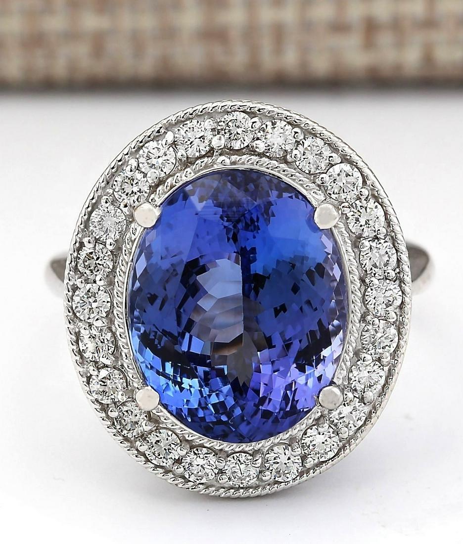 10.11 CTW Natural Blue Tanzanite And Diamond Ring In: 10.11 CTW Natural Blue Tanzanite And Diamond Ring In 18K White Gold Manufacturer's Suggested Retail Price: $ 13250.00 Stamped: 18K Ring Size: 6.75 Total Ring Weight: 8.3 Grams Diamond Weight: Total Na