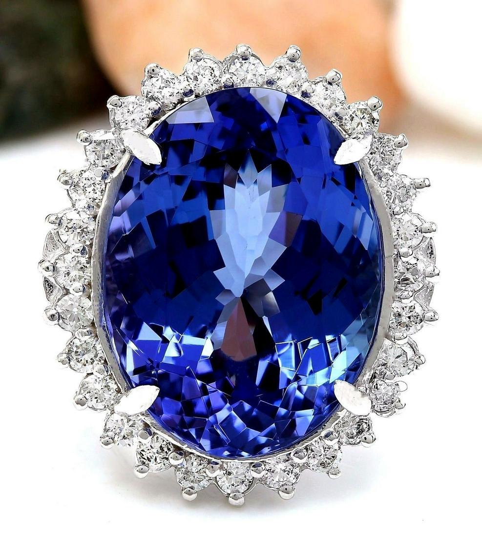 19.64 CTW Natural Tanzanite 18K Solid White Gold: 19.64 CTW Natural Tanzanite 18K Solid White Gold Diamond Ring Manufacturer's Suggested Retail Price: $ 23750.00 19.64 Carat Natural Tanzanite 18K Solid White Gold Diamond Ring Item Type: Ring Item Sty