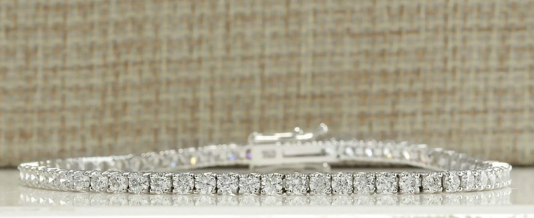 4.50CTW Natural Diamond Bracelet In 18K Solid White: 4.50CTW Natural Diamond Bracelet In 18K Solid White Gold Manufacturer's Suggested Retail Price: $ 18800.00 Stamped: 18K Bracelet Width: 2.90mm Bracelet Length: 7.5 Inches Total Bracelet Weight: 8.4Gra