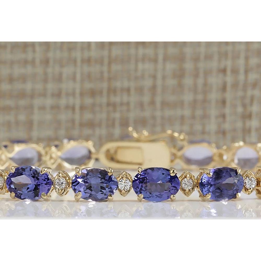 18.03CTW Natural Tanzanite And Diamond Bracelet In 18K: 18.03CTW Natural Tanzanite And Diamond Bracelet In 18K Solid Yellow Gold Manufacturer's Suggested Retail Price: $ 8500.00 Stamped: 18K Bracelet Width: 5.60mm Bracelet Length: 7.5 Inches Total Bracelet
