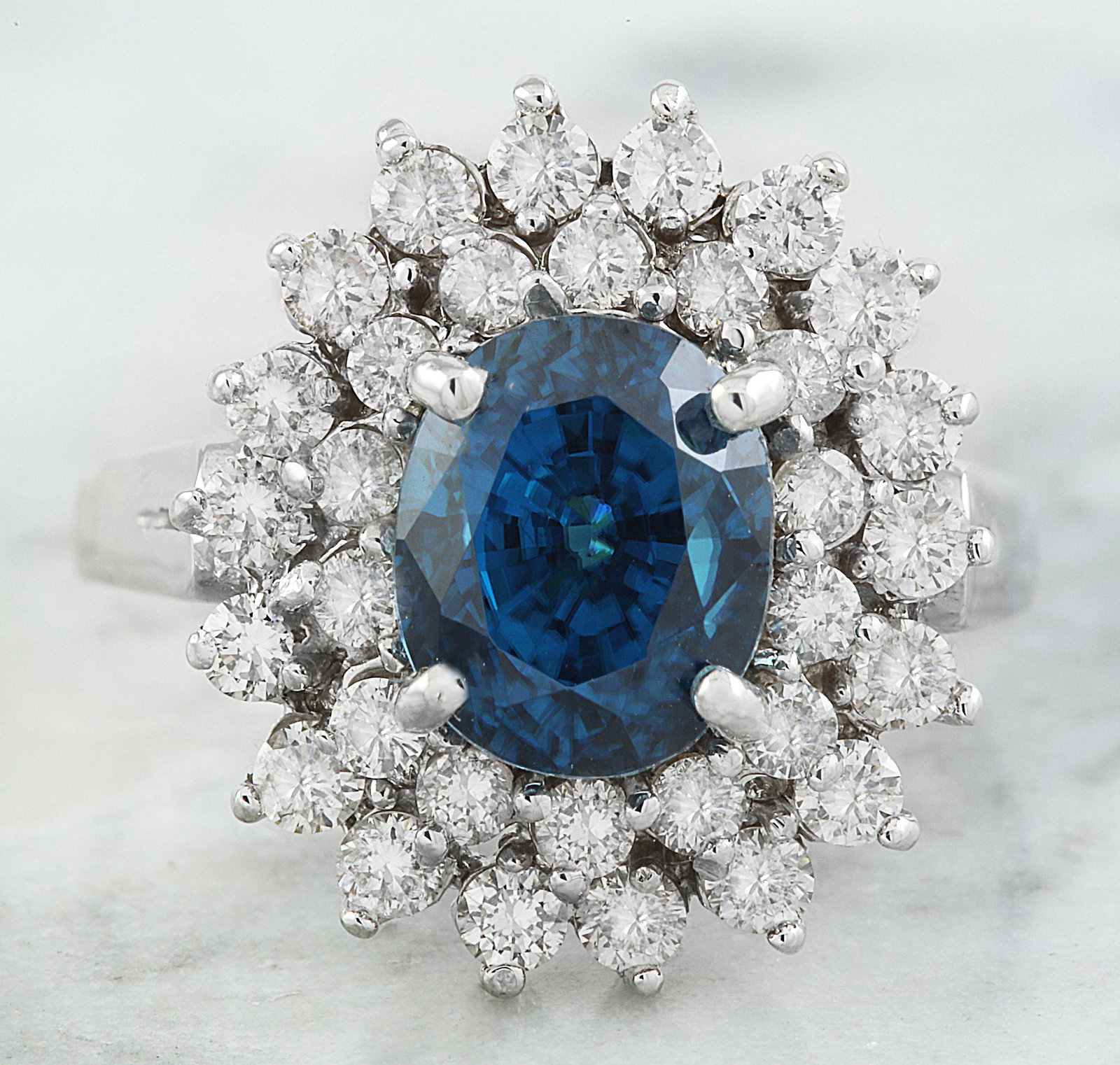 6.30 CTW Zircon 18K White Gold Diamond Ring: 6.30 CTW Zircon 18K White Gold Diamond Ring Manufacturer's Suggested Retail Price: $ 7250.00 Stamped: 18K Total Ring Weight: 5.8 Grams Zircon Weight 5.20 Carat (8.50x6.70 Millimeters) Diamond Weight: 