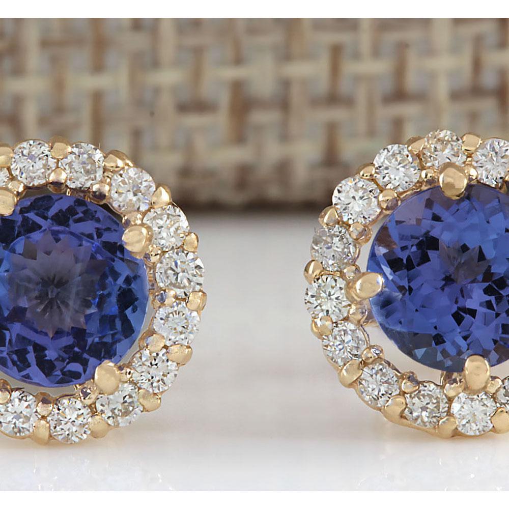 2.90CTW Natural Tanzanite And Diamond Earrings 18K: 2.90CTW Natural Tanzanite And Diamond Earrings 18K Solid Yellow Gold Manufacturer's Suggested Retail Price: $ 4000.00 Stamped: 18K Total Earring Weight: 1.5Grams Diamond Weight: Total Natural diamond 