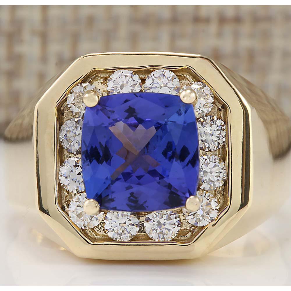 MENS 4.04 CTW Natural Blue Tanzanite And Diamond Ring: MENS 4.04 CTW Natural Blue Tanzanite And Diamond Ring 14k Solid Yellow Gold Manufacturer's Suggested Retail Price: $ 8150.00 Stamped: 14K Ring Size: 7 Total Ring Weight: 13.5 Grams Diamond Weight: Tot