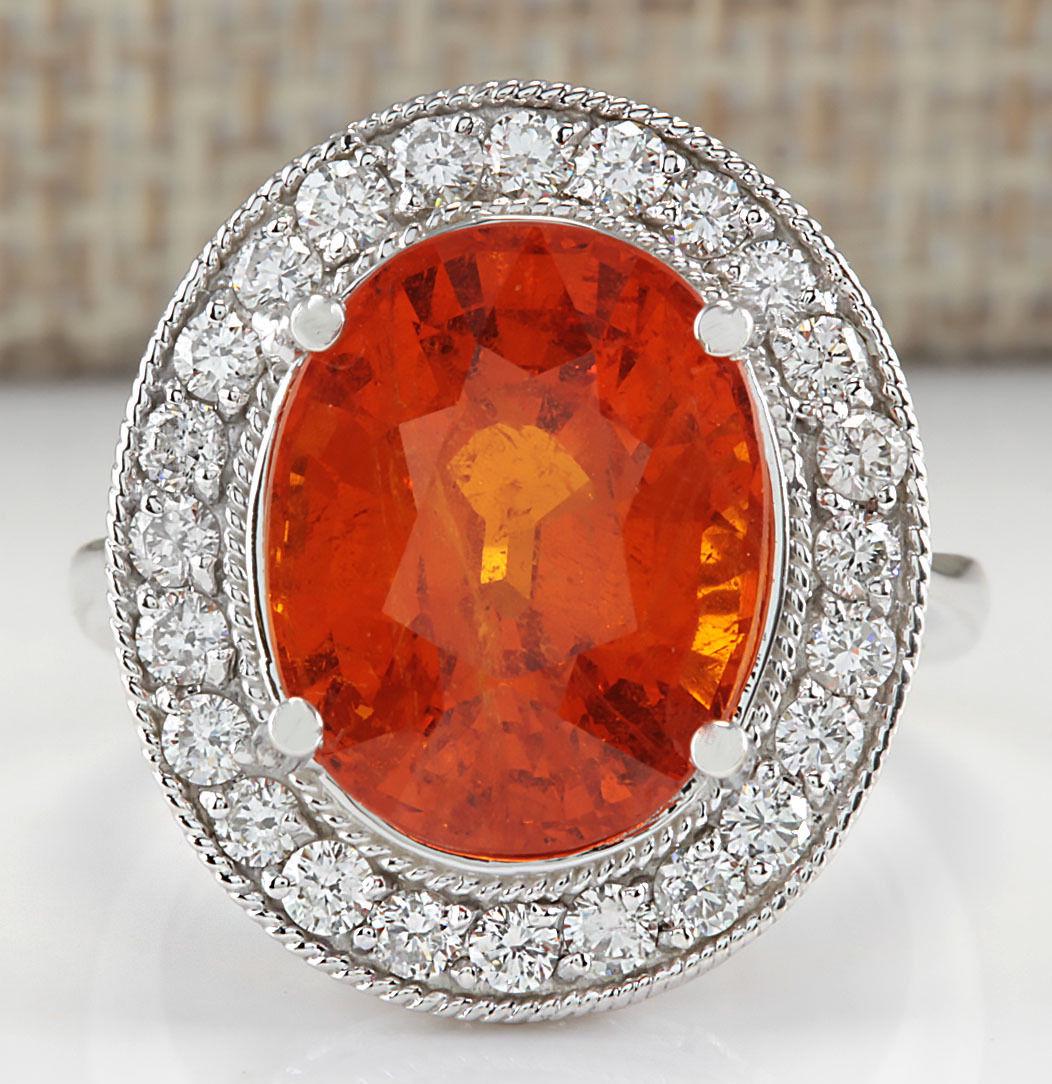 12.31 CTW Natural Mandarin Garnet And Diamond Ring 18K: 12.31 CTW Natural Mandarin Garnet And Diamond Ring 18K Solid White Gold Manufacturer's Suggested Retail Price: $ 16950.00 Stamped: 18K Ring Size: 6.75 Total Ring Weight: 7 Grams Diamond Weight: Total 