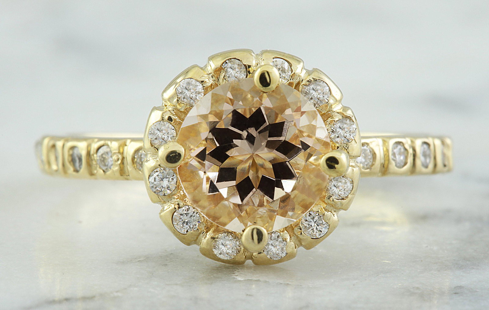 1.24 CTW Morganite 18K Yellow Gold Diamond Ring: 1.24 CTW Morganite 18K Yellow Gold Diamond Ring Manufacturer's Suggested Retail Price: $ 2350.00 Stamped: 18K Ring Size: 7 Total Ring Weight: 3 Grams Morganite Weight: 1.00 Carat (7.00x7.00) Diamond W