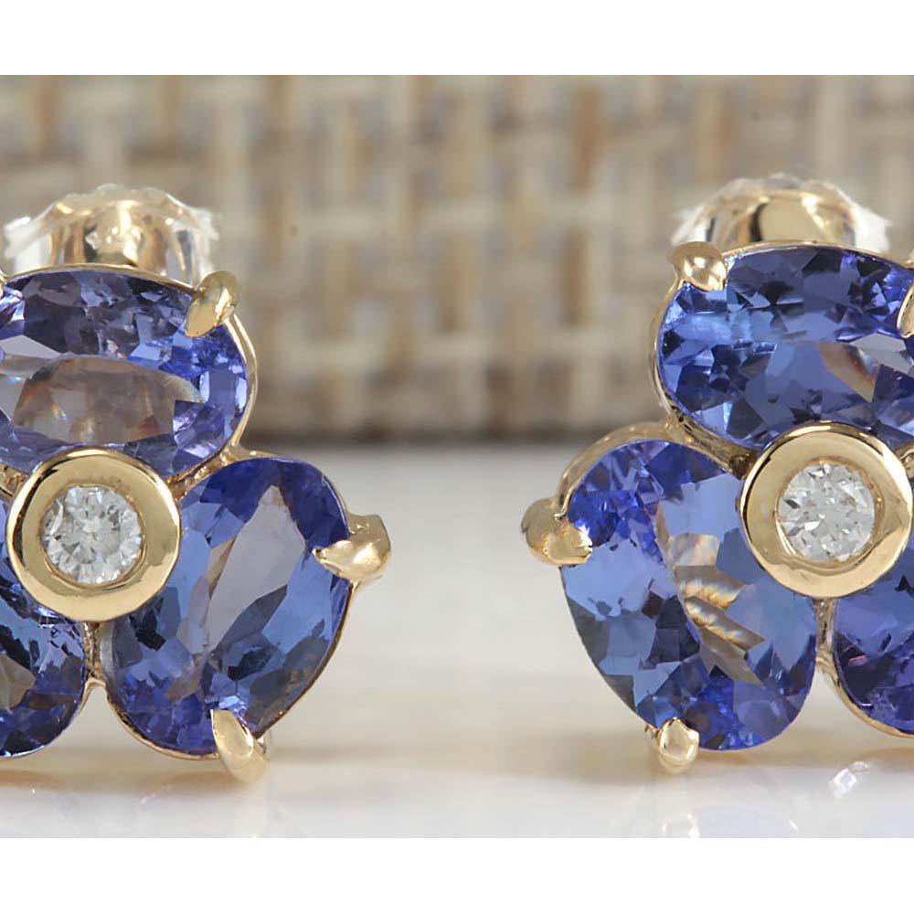 3.06 CTW Natural Blue Tanzanite And Diamond Earrings In: 3.06 CTW Natural Blue Tanzanite And Diamond Earrings In 18K Yellow Gold Manufacturer's Suggested Retail Price: $ 1800.00 Stamped: 18K Total Earrings Weight: 2.9 Grams Diamond Weight: Total Natural dia