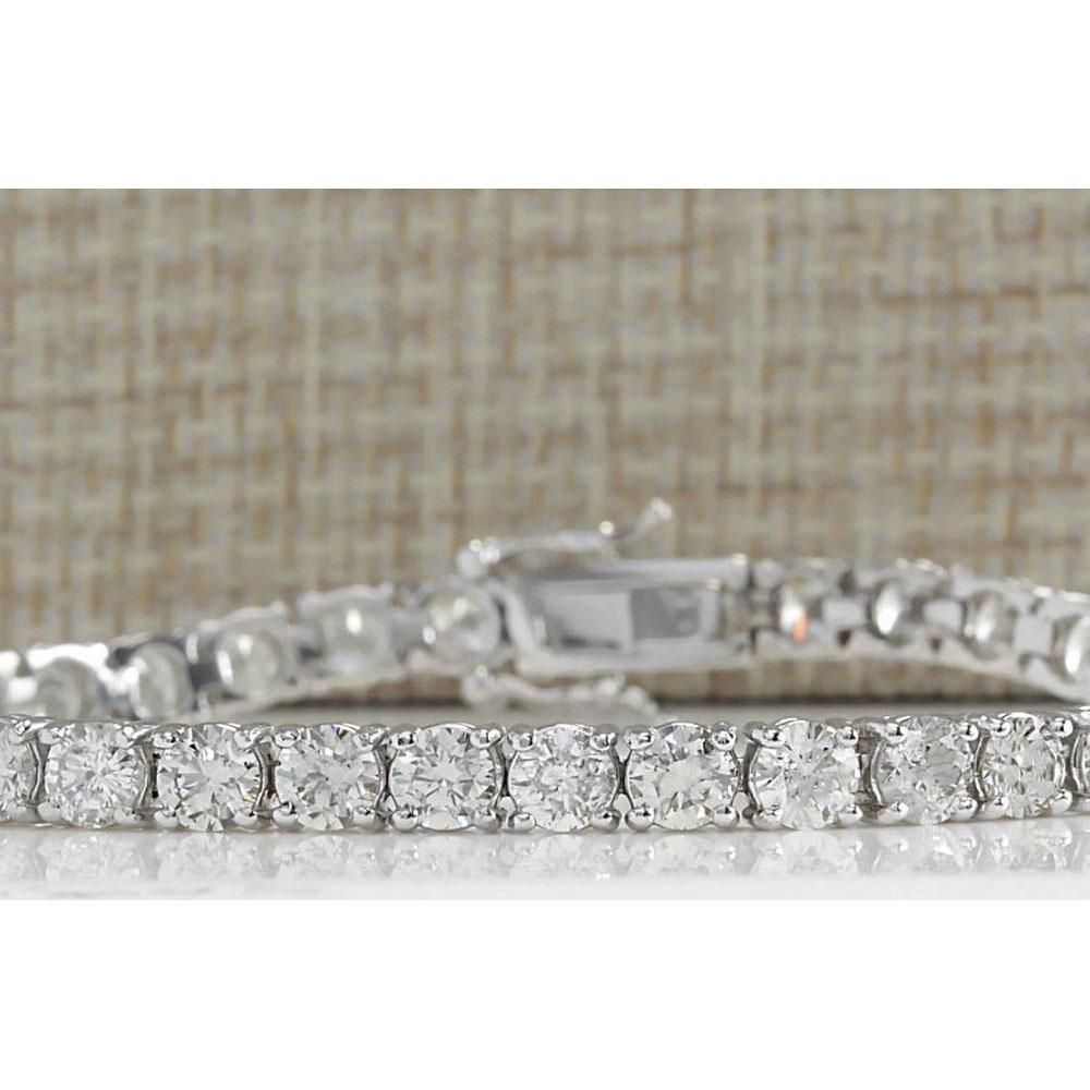12.00 CTW Natural Diamond Bracelet In 14K Solid White: 12.00 CTW Natural Diamond Bracelet In 14K Solid White Gold Manufacturer's Suggested Retail Price: $ 48150.00 Stamped: 14K Bracelet Width: 4.35mm Bracelet Length: 7.5 Inches Total Bracelet Weight: 14 G