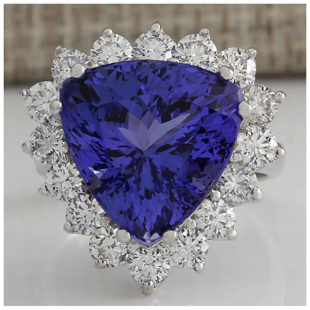 13.87 CTW Natural Blue Tanzanite And Diamond Ring 18K: 13.87 CTW Natural Blue Tanzanite And Diamond Ring 18K Solid White Gold Manufacturer's Suggested Retail Price: $ 21850.00 Stamped: 18K Ring Size: 6.5 Total Ring Weight: 10 Grams Diamond Weight: Total N