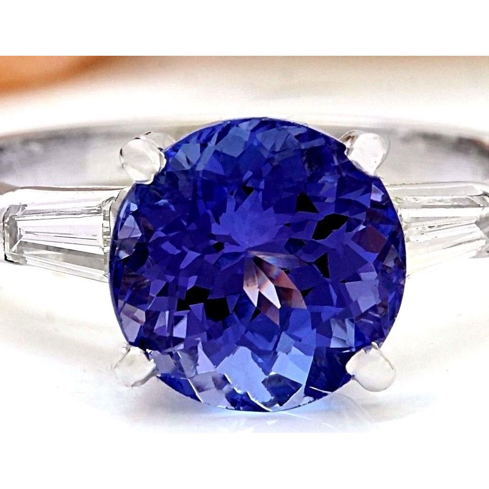 3.42 CTW Natural Tanzanite 14K Solid White Gold Diamond: 3.42 CTW Natural Tanzanite 14K Solid White Gold Diamond Ring Manufacturer's Suggested Retail Price: $ 5500.00 3.42 Carat Natural Tanzanite 14K Solid White Gold Diamond Ring Item Type: Ring Item Style: